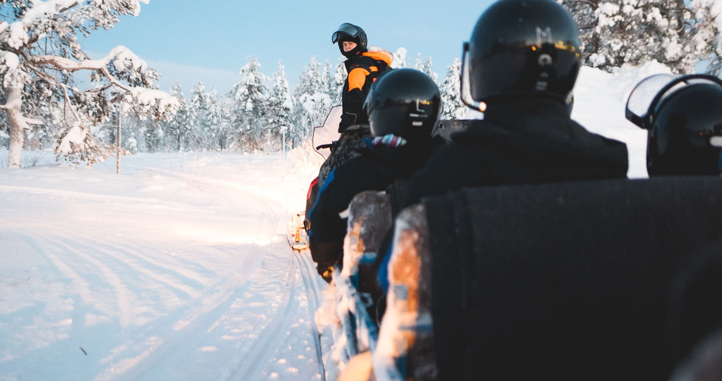 Snowmobile Safari into the Arctic Circle Forest by Wild Nordic in Rovaniemi Finland