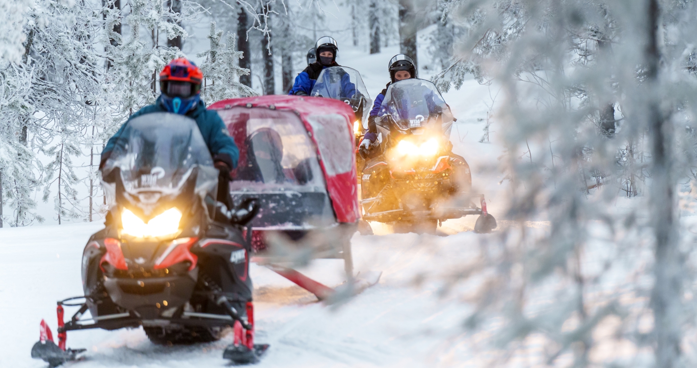 Snowmobile Safari into the Arctic Circle Forest by Wild Nordic in Rovaniemi Finland